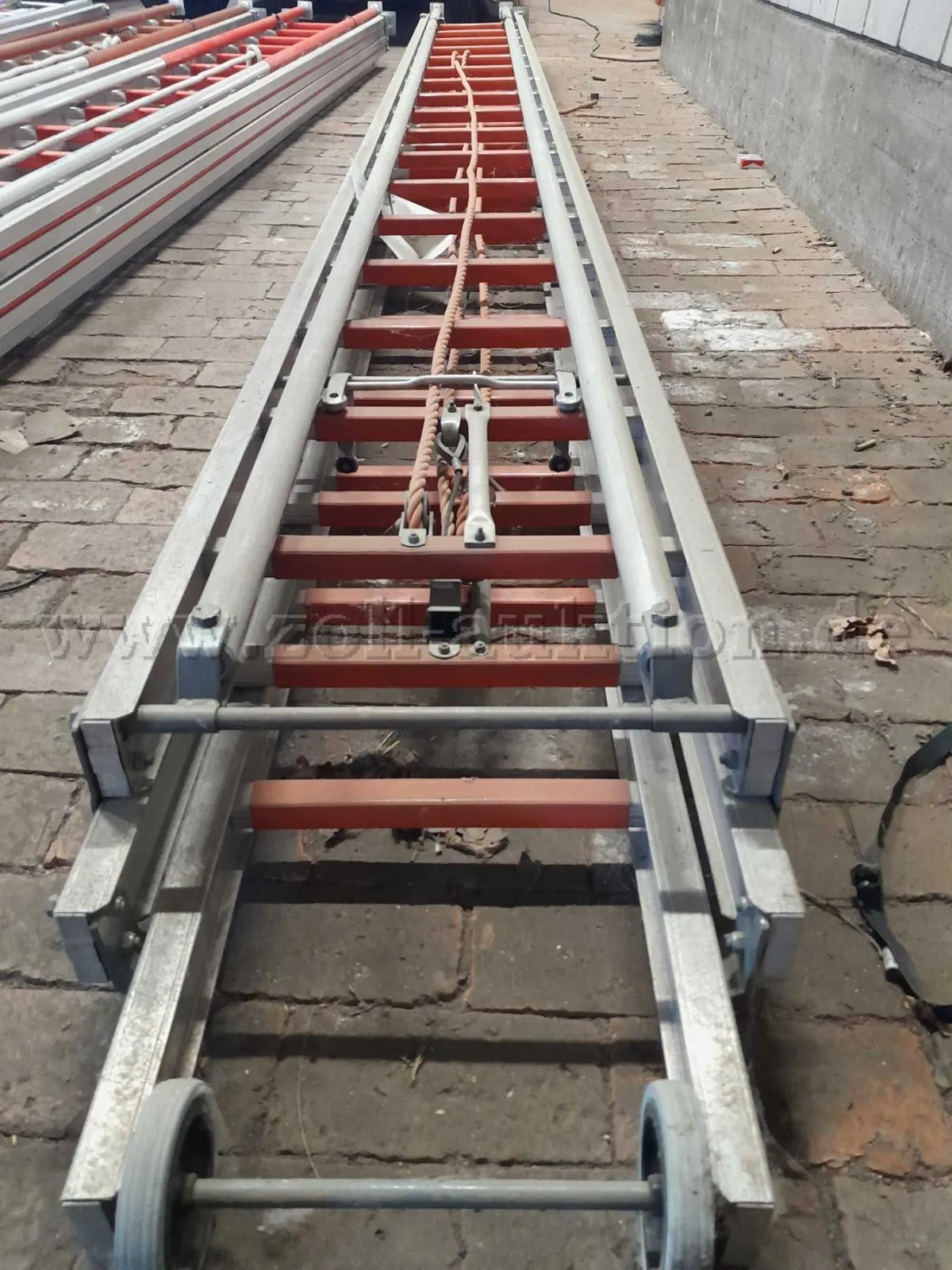 1 HACA three-part sliding ladder