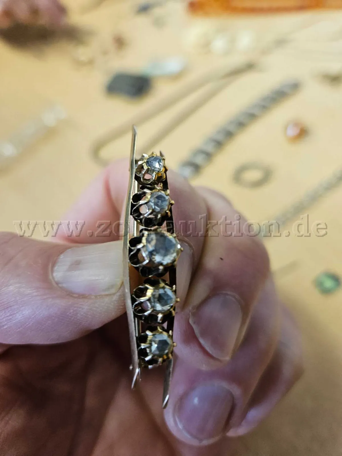 1 broche en or 585 avec diamants