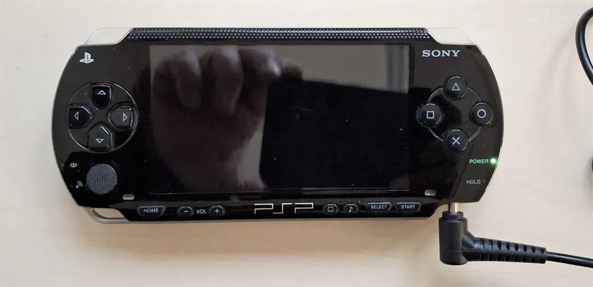 1 PlayStation Portable, PSP-1000 Series, schwarz, als Teilespende