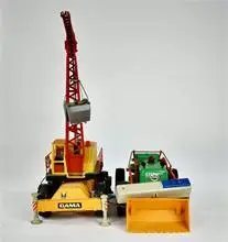 Grue et excavatrice