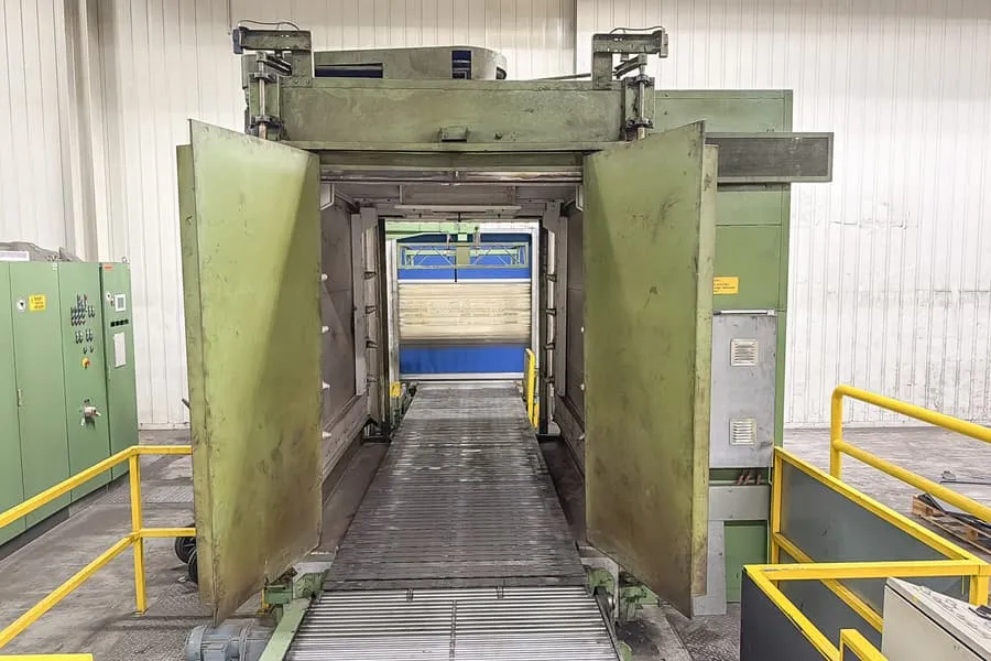 Schwank shrink wrapping line with baling press
