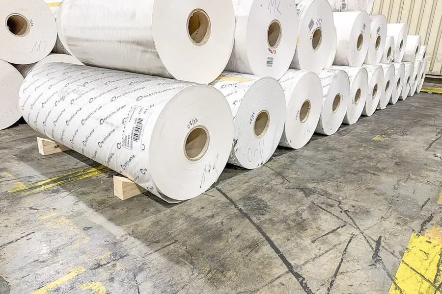 11 rolls of coated industrial packaging paper, printed