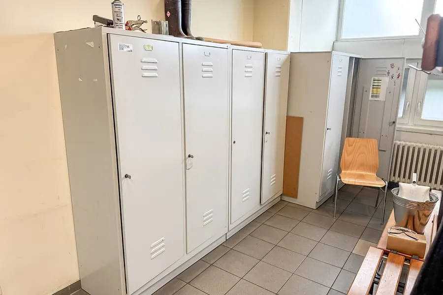 3 metal lockers, each with 2 doors