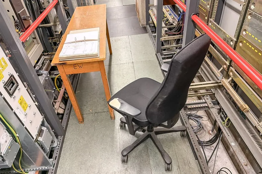 Table and office swivel chair