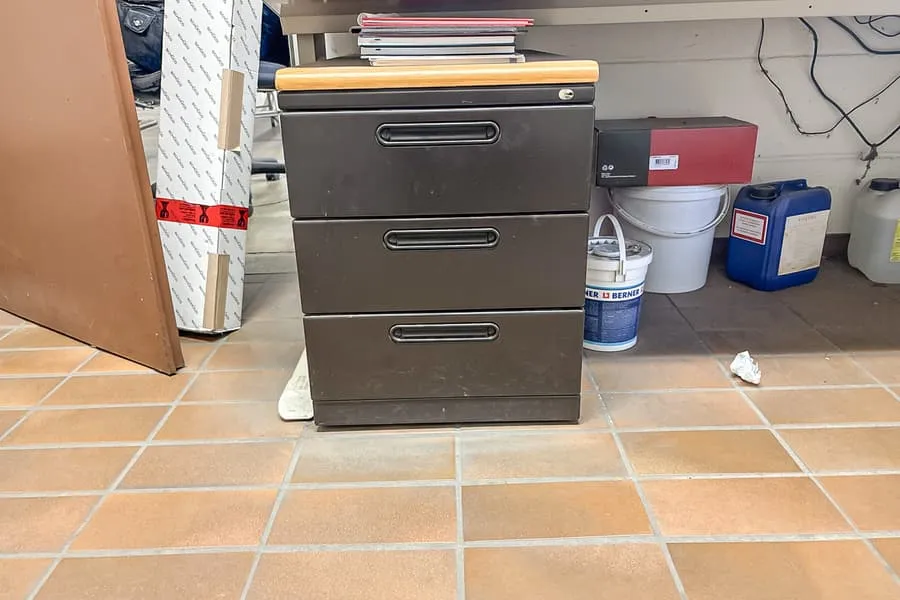 2 roller containers with contents: small parts