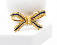 Schleifenbrosche, auch als Anhänger zu tragen, 18kt Gelbgold, Emaille, kleine Perlen, ca. 8.1 g