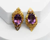 Paar Ohrclips, 14kt Gelbgold, zwei Amethyste, oval facettiert, zus. ca. 9.5 g
