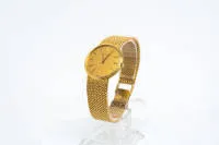 Audemars Piguet, Herrenarmbanduhr, 18kt Gelbgold, Ref. BA6055519, Quartz, Werknr. B88452, mit originalem Etui im Umkarton sowie Papieren, verlötetes Goldarmband, Handgelenksumfang ca. 18,5 cm, ø 30mm exkl. Krone, Gesamtgewicht 66 g, Kaufrechnung 1989,...
