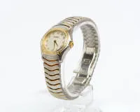 Ebel Classic Wave, Damenarmbanduhr, bicolor in Stahl/18kt Gelbgold mit Brillantlünette, Ref. E1157F14-16, No. 55614119, perlmuttfarbenes Zifferblatt mit Diamantindizes und Signatur "EBEL", umlaufende Lünette in GG mit 42 kleinen Brillanten,...