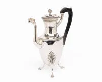 Small Neoclassical coffee pot, Paris, ca. 1798, maker's mark S.L.P., animal head spout, handle in ebonized wood, H. 19.5 cm, approx. 440 g