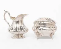 Sugar bowl, silver 925, oval form, gilt interior, on four small curved feet, body and lid wavy, 9 x 14 x 11 cm, approx. 307 g;