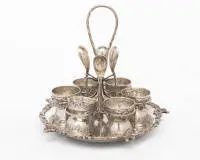 Support à œufs, avec six coquetiers, 4 petites cuillères, argent 800, vers 1920, marqué Gebrüder Friedländer, plateau rond, bord motif rocaille, pied assorti, env. 724 g