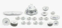 Uitzonderlijk vissen servies "Corail La Mer", manufactuur A. Giraud & Cie, Limoges, rijk visdecor in blauw en goud, bestaande uit: grote dekselterrine op schotel, handvatten in vorm van vis of vinnen, 10 borden, 10...