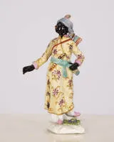 Oriental figurine, Meissen, mid-18th century, sword mark (faded), model attributed to Peter Reinicke, dark-skinned figure with quiver and bow, approx. 13 cm high, glued