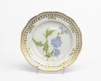Royal Copenhagen, Flora Danica, reticulated plate, Copenhagen, 1979-1984, model number 3553, polychrome painted and richly gilded, pierced rim with serrated edge, centre depiction of Common Chicory (Chiorium Intybus L.), reverse...