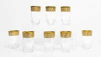 8 verres à eau de la Cristallerie Saint-Louis, "Thistle Gold", France, 20e s., cristal avec décor gravé et taillé, riches bordures dorées, fond avec marque à l'acide, H. env. 11 cm