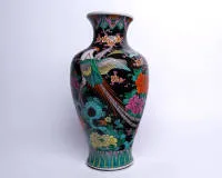 Baluster vase, Japan, 20th c., porcelain, birds among flowering branches on rocky ground, polychrome, on black ground, borders, black Japanese mark Matsueda on the base, 45 cm high