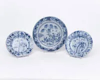 3 plates, China, Qing Dynasty, 18th c., porcelain, various blue and white decors, 2x squirrel and grape pattern, 1x lady and boy under willow tree, ø approx. 22.7-31 cm, small rim chips, small hairline crack