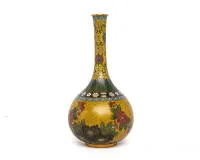 Japanese cloisonné vase (Shippō), Meiji period, circa 1900, probably Nagoya or Kyōto. Baluster or bottle form with long neck, brass/copper with cloisonné enamel, yellow ground with peonies, scrolling foliage, geometric pattern and borders, with...