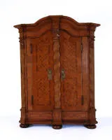 Baroque cupboard, Franconia, mid-18th c., walnut and other veneers, two-door body with serpentine pediment and chamfered corners, front with three spiral pilasters, diamond marquetry on three sides, interior fitted as bar cabinet, 185 x 147 x 51 cm, additions, somewhat faded on left side