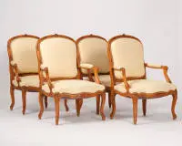 Set of four Louis XV style armchairs, carved beech, renewed light upholstery, H. 99 cm