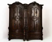 Two-part sacristy cupboard, Trier/Mosel, Rococo, mid-18th c., oak, two-part body structured like a confessional divided in the centre, the fronts of the halves each concave with one door and one base drawer,...