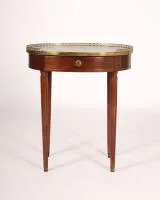 Neoclassical side table, Louis XVI, France, circa 1780, stamped F. SCHEY, mahogany, oval body with frieze drawer and white alabaster top in openwork brass gallery on four conical round legs, underside with stamp...