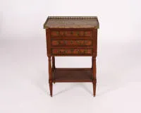 Guéridon, Louis XVI, France, circa 1780, mahogany, body with three drawers under marble top with three-sided bronze gallery, four round legs with stretcher in lower third, bronze mounts, one key, 73.5 x 48.5 x 32 cm