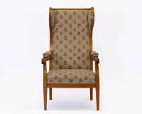 Wingback chair, Biedermeier, 1st third 19th c., cherry, ebonized decorative elements, floral upholstery worn, h. 119 cm