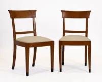 Pair of chairs, Biedermeier, first third 19th c., cherry, ebonized feet, light upholstery with soiling, H. 88 cm, signs of age and use