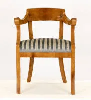 Elegant fauteuil, Biedermeier, South German, circa 1820/1830, cherry veneer on softwood, horseshoe-shaped back raised in the centre, splayed sabre legs under high veneered apron, fixed seat cushion with renewed striped cover, H. cm