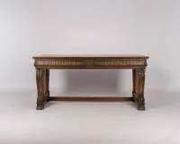 Neo-Renaissance desk, 1st third 20th c., solid and veneered oak, rectangular top on curved sides with rich carving, walnut burl veneer panels, two drawers, 81 x 170 x 90 cm