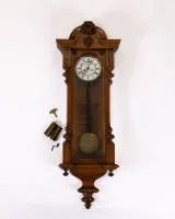 Large historicist regulator, circa 1900, architectural walnut-veneered case, white enamel dial, spring strike