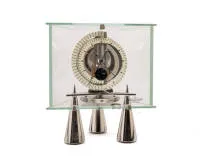 Rare Jaeger LeCoultre Atmos Atlantis table clock, Switzerland, circa 2000, calibre 548, no. 696920, with moon phase, trapezoidal glass case on three silver-coloured cones, spiral dial with moon phase above the "6", 28 x 25 x 15 cm, movement ran...