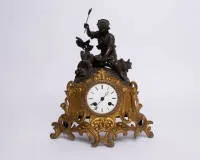 Figural clock "Woodcutter", France, 2nd half 19th c., figurative bronze, baroque decor, white enamel, movement and pendulum