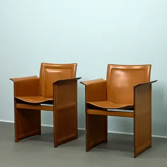 TITO AGNOLI. Pair of armchairs model 'Korium' for Matteo Grassi, leather, Italy, 1980s (2).