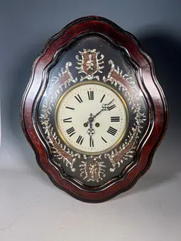 Horloge murale française 'Ochsenauge' fin 19e siècle.