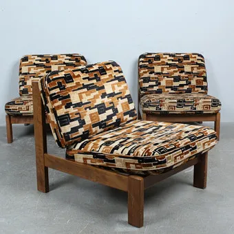 Three brutalist lounge chairs from the 1970s.