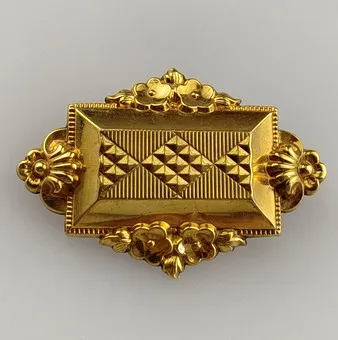 Gouden broche - schuimgoud.