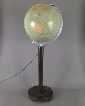 Grand globe terrestre Columbus sur haut support.