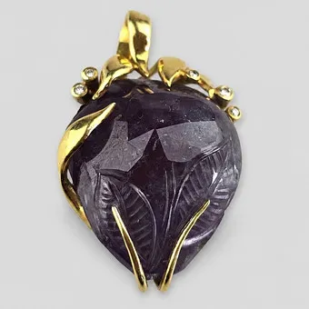 EXTRAVAGANTER COLLIERANHÄNGER MIT GROSSEM DIAMANT 18 KARAT GOLD.
