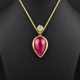 Ruby pendant with diamond on delicate chain - yellow gold 585.