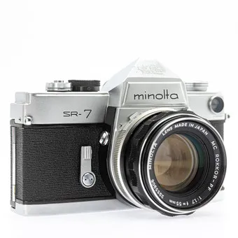 Minolta SR 7, 35mm SLR camera (SN 2116542) with Minolta Lens MC Rokkor-PF 1:17/55mm (SN 2955906) lens.