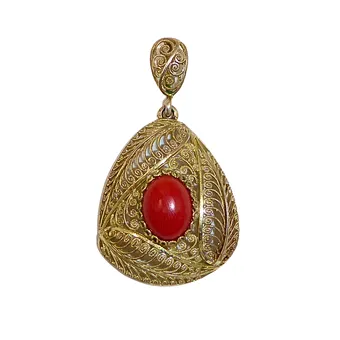 Drop-shaped pendant in 835 silver with red cabochon.