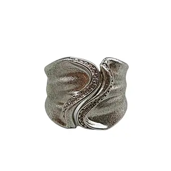 METALLRING MIT ZIERSTEINEN UND ORIGINALVERPACKUNG.
