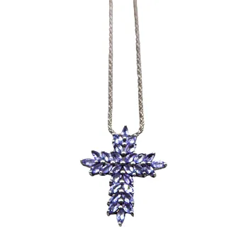 Tanzanite cross pendant in 925 silver on a 925 silver chain.