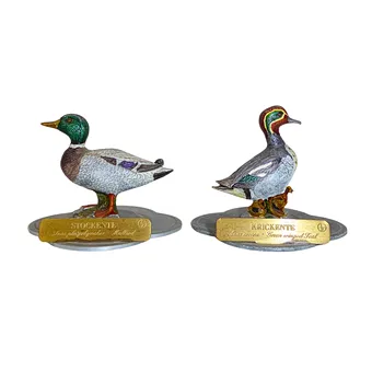TWEE VOGELFIGUREN NAAR JOHN GOULD, HAEFELIN TIN GIETWERK.