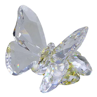 SWAROVSKI VLINDER OP EEN BLOEM.
