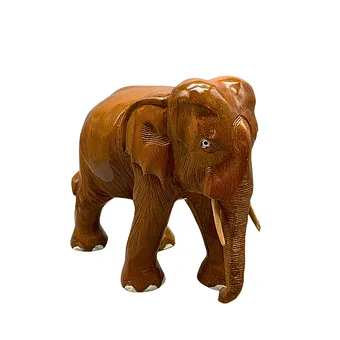 HANDGESCHNITZTE ELEFANTENFIGUR AUS HOLZ.