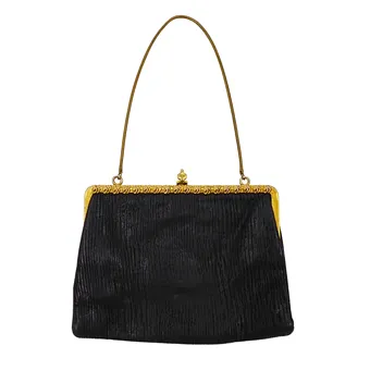 SAC À MAIN NOIR EN TEXTILE STRUCTURÉ.